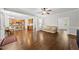 Open concept living space with hardwood floors and seamless flow to kitchen and dining at 1007 Surry Dale Ct, Apex, NC 27502