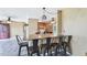 Open floor plan features a bar with seating and views into the kitchen at 102 Pine St, Dunn, NC 28334