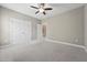 Carpeted bedroom features double closets and neutral paint at 105 Bagley Ln, Dunn, NC 28334