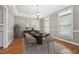 Elegant dining room with coffered ceiling and ample natural light at 105 Bagley Ln, Dunn, NC 28334