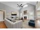 Cozy living room featuring a fireplace, vaulted ceiling and modern furnishings at 105 Bagley Ln, Dunn, NC 28334