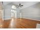 Expansive living room with hardwood floors and views to entry, offering flexibility for various layouts at 105 Bagley Ln, Dunn, NC 28334