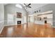 Open-concept living room with fireplace connects to the bright, modern kitchen at 105 Bagley Ln, Dunn, NC 28334