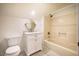 Full bathroom with shower and bathtub, white vanity, and toilet at 106 Redbud, Pittsboro, NC 27312