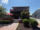 Charming building featuring a rooftop patio and a black awning over the entrance at 106 Redbud, Pittsboro, NC 27312