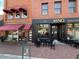 Picturesque storefront with outdoor seating and an eye-catching red awning at 106 Redbud, Pittsboro, NC 27312