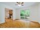 Spacious living room with hardwood floors and sliding glass doors leading to a private deck at 106 Redbud, Pittsboro, NC 27312