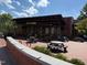 Inviting outdoor seating area at Havoc Brewing Co. with picnic tables and a brick patio at 106 Redbud, Pittsboro, NC 27312