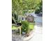 Inviting two-story home with brick and siding, featuring a well-maintained lawn, front yard landscaping, and a convenient mailbox at 109 Elmview Dr, Cary, NC 27519
