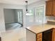 Open kitchen layout leading to a cozy living space at 109 Elmview Dr, Cary, NC 27519