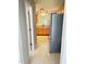 Kitchen featuring wood cabinets and stainless steel refrigerator at 109 Elmview Dr, Cary, NC 27519
