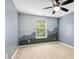 Bedroom with ceiling fan and custom-painted mountain mural at 109 Faldo Cv, Raleigh, NC 27603
