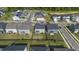 An aerial view of a new construction neighborhood with houses, green spaces, and street at 1165 Sun Spgs Rd, Wake Forest, NC 27587