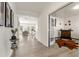 Bright foyer showcasing beautiful hardwood floors, an open floor plan, and natural light at 1165 Sun Spgs Rd, Wake Forest, NC 27587
