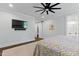 Relaxing bedroom showcasing wood floors, ceiling fan and closet at 125 Lord Ashley Rd, Raleigh, NC 27610
