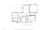 First floor layout featuring kitchen, living room, primary bedroom suite and garage at 125 Lord Ashley Rd, Raleigh, NC 27610