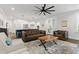 Spacious living room adjacent to kitchen offers seating and natural light at 125 Lord Ashley Rd, Raleigh, NC 27610