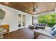 Relaxing screened-in patio with stylish furniture and serene outdoor views at 125 Lord Ashley Rd, Raleigh, NC 27610