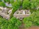 Aerial view of residential property with mature trees providing shade at 1305 Queensferry Rd, Cary, NC 27511