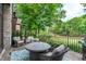 Outdoor patio featuring comfortable seating, a view of the golf course, and a cozy atmosphere at 1305 Queensferry Rd, Cary, NC 27511