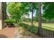 Enjoy the lush greenery and golf course views in this serene backyard setting at 1305 Queensferry Rd, Cary, NC 27511
