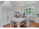 Gourmet kitchen with marble countertops, a large island, and stainless steel appliances at 1305 Queensferry Rd, Cary, NC 27511