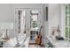 Cozy living room featuring french doors leading to outdoor patio area at 1305 Queensferry Rd, Cary, NC 27511