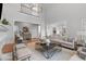 Spacious living room with high ceilings, a fireplace, and lots of natural light at 1305 Queensferry Rd, Cary, NC 27511