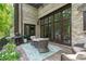 Outdoor patio with seating area, grill, and beautiful landscape is great for entertaining at 1305 Queensferry Rd, Cary, NC 27511