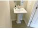 Pedestal sink in half bath is perfect for guests at 1311 Arena Ln, Fuquay Varina, NC 27526