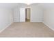 Carpeted bedroom with a standard ceiling light and access door at 1311 Arena Ln, Fuquay Varina, NC 27526