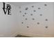 Dog nook with paw print decals on the wall at 1311 Arena Ln, Fuquay Varina, NC 27526