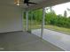 A screened-in patio with outdoor views of the back yard at 1311 Arena Ln, Fuquay Varina, NC 27526