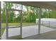 A screened-in porch offers outdoor views of the fenced back yard at 1311 Arena Ln, Fuquay Varina, NC 27526