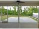 Screened-in porch and patio offers an outdoor view of the backyard and landscaping at 1311 Arena Ln, Fuquay Varina, NC 27526