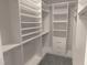 Walk-in closet featuring custom shelving and drawers at 1311 Arena Ln, Fuquay Varina, NC 27526