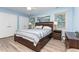 Comfortable bedroom with hardwood floors, closet, and natural light, offering a clean and cozy atmosphere at 139 Hollyhock Ct, Durham, NC 27713