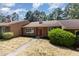 Charming single-story home with a red front door, well-maintained landscaping, and a cozy curb appeal at 139 Hollyhock Ct, Durham, NC 27713