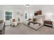 Serene bedroom featuring a large bed, decorative wall hangings, and soft natural light at 140 Summer Mist Ln # 159, Clayton, NC 27527