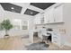 Bright home office with dual workspaces, custom built-ins, a modern ceiling design, and a large window at 140 Summer Mist Ln # 159, Clayton, NC 27527