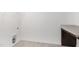 Functional laundry area with sleek cabinetry and modern hexagonal tile flooring at 140 Summer Mist Ln # 159, Clayton, NC 27527