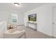 Bright and airy loft area with plush seating and a sleek console table at 140 Summer Mist Ln # 159, Clayton, NC 27527