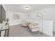 Cozy loft area perfect for a reading nook, featuring comfortable chairs and soft lighting at 140 Summer Mist Ln # 159, Clayton, NC 27527