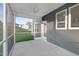 A screened patio with concrete flooring and a ceiling fan offers a great outdoor space at 140 Summer Mist Ln # 159, Clayton, NC 27527
