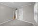 Neutral bedroom with new carpeting at 1416 Chestnut St, Roxboro, NC 27573