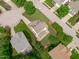 Aerial view of a home featuring an inviting backyard, lush landscaping, and surrounding neighborhood at 1514 Hinchliff Ct, Fuquay Varina, NC 27526