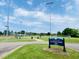 Fuquay-Varina Ballentine School Park featuring baseball fields and community amenities under a partly cloudy blue sky at 1514 Hinchliff Ct, Fuquay Varina, NC 27526