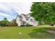 Charming two-story home with manicured lawn and inviting front porch at 1514 Hinchliff Ct, Fuquay Varina, NC 27526