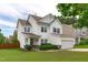 Charming two-story home with attached two car garage, landscaped yard and pleasing curb appeal at 1514 Hinchliff Ct, Fuquay Varina, NC 27526