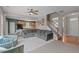 Open concept living room connects to kitchen, with stairs leading to upper level at 1514 Hinchliff Ct, Fuquay Varina, NC 27526